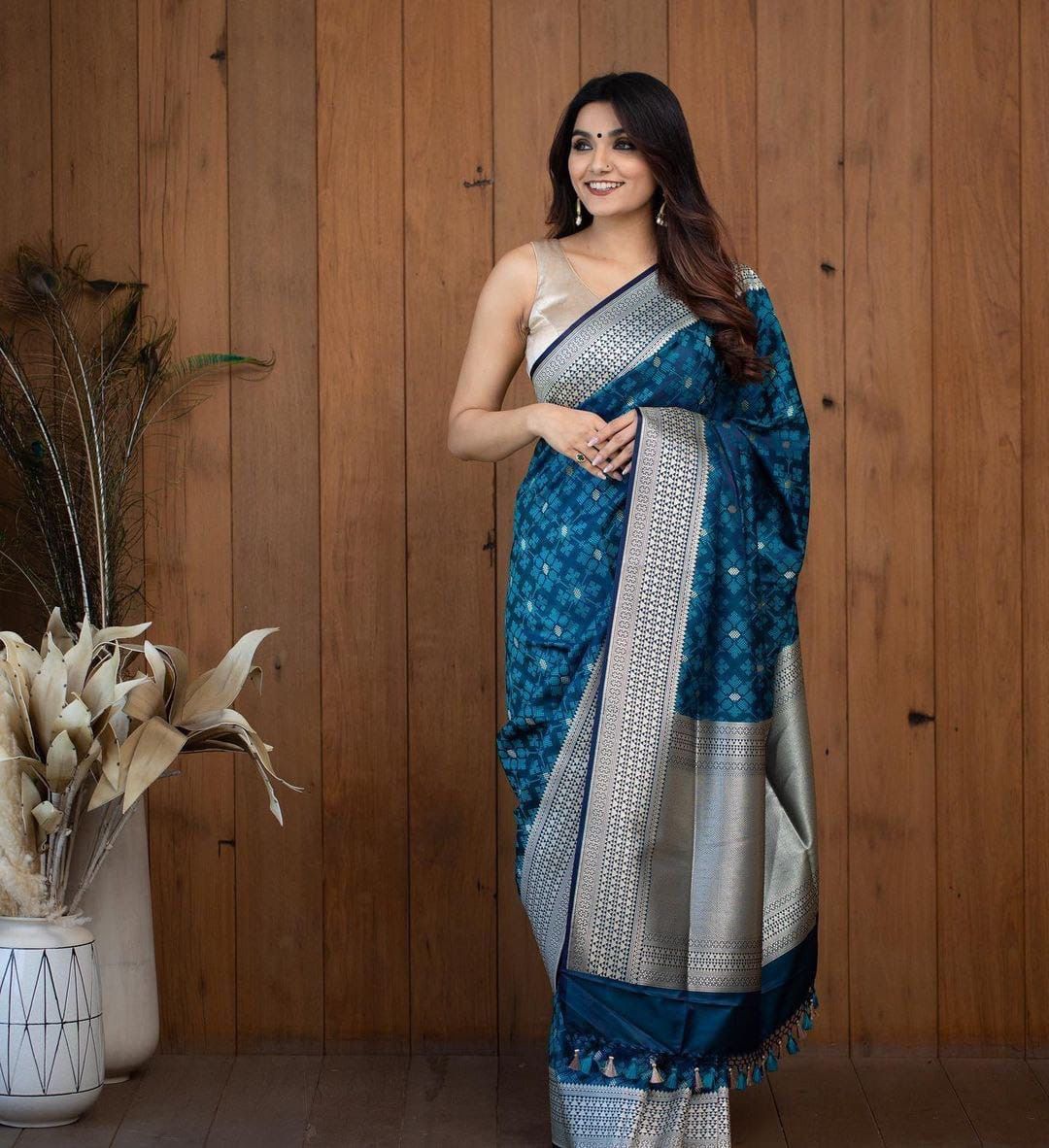 Turquoise blue and silver-toned Woven Design Zari Silk Blend Banarasi Saree