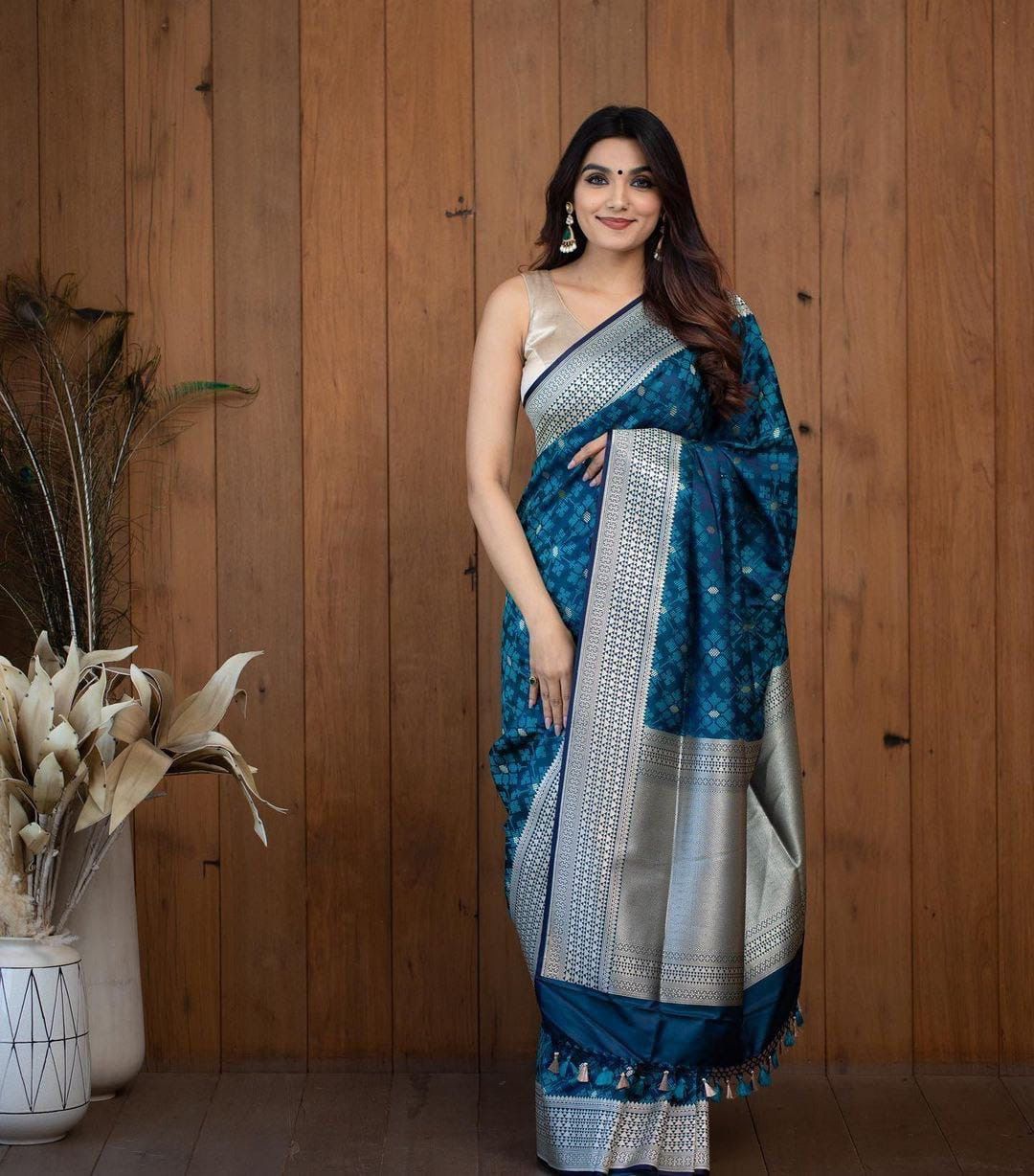 Turquoise blue and silver-toned Woven Design Zari Silk Blend Banarasi Saree