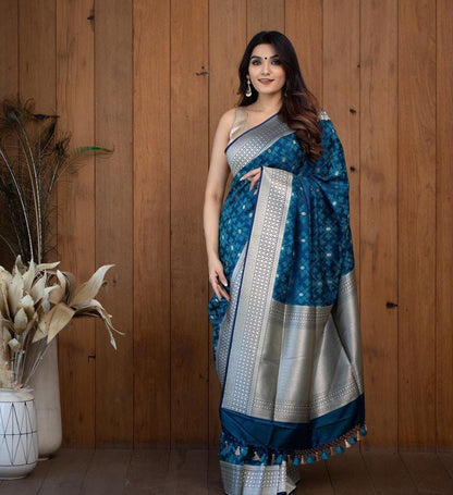 Turquoise blue and silver-toned Woven Design Zari Silk Blend Banarasi Saree