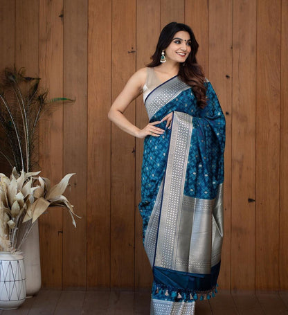 Turquoise blue and silver-toned Woven Design Zari Silk Blend Banarasi Saree