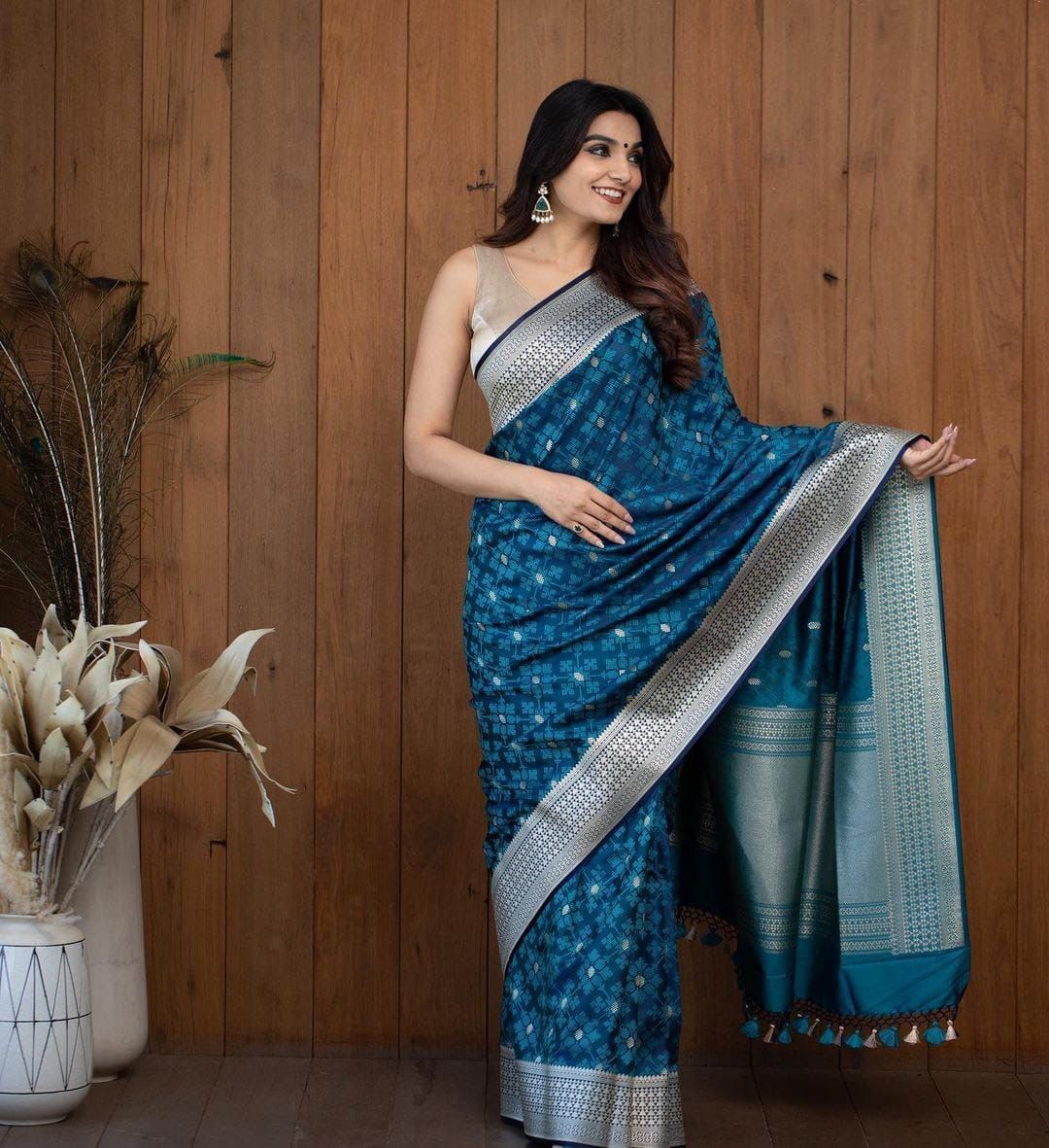 Turquoise blue and silver-toned Woven Design Zari Silk Blend Banarasi Saree