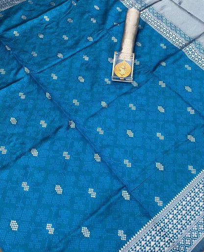 Turquoise blue and silver-toned Woven Design Zari Silk Blend Banarasi Saree