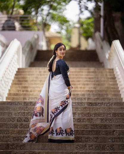 Classic White Linen Saree With Elephant Motif Border & Blouse Pieace