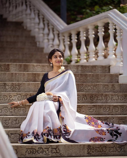 Classic White Linen Saree With Elephant Motif Border & Blouse Pieace