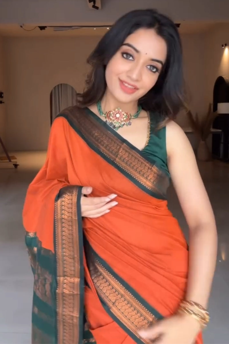 Marvellous Orange Soft Silk Saree With Unique Blouse Piece