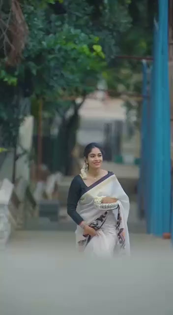 Classic White Linen Saree With Elephant Motif Border & Blouse Pieace